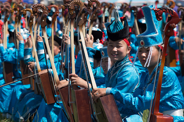 Opening ceremony at the Bulgan Naadam. Local Morin Khuur (Horse Head Fiddle) players take their positions Opening ceremony at the Bulgan Naadam.