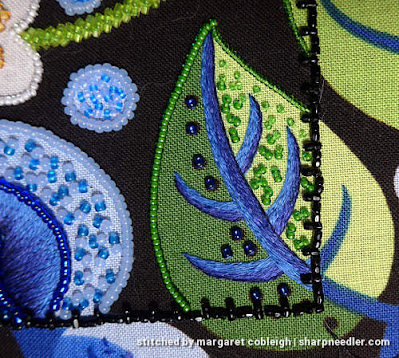Lower right hand leaf filled with pairs and single green beads (para) in a shaded manor (original filling). (Wild Child Japanese Bead Embroidery by Mary Alice Sinton)