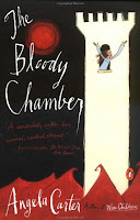 The Bloody Chamber bookcover. Black background, white castle with girl hanging out and calling for help, surrounded by angry red waves