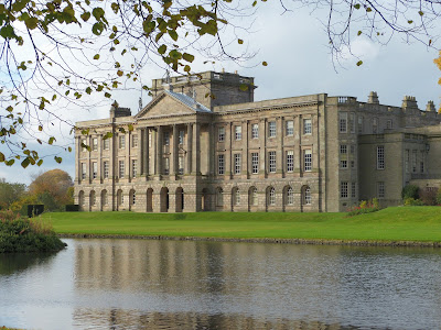 View of Lyme Park over the lake