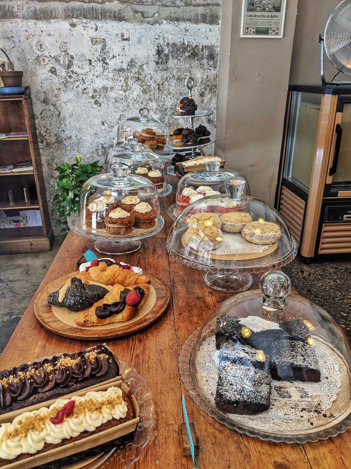 A table spread of entirely vegan cakes and pastries from La Besnéta