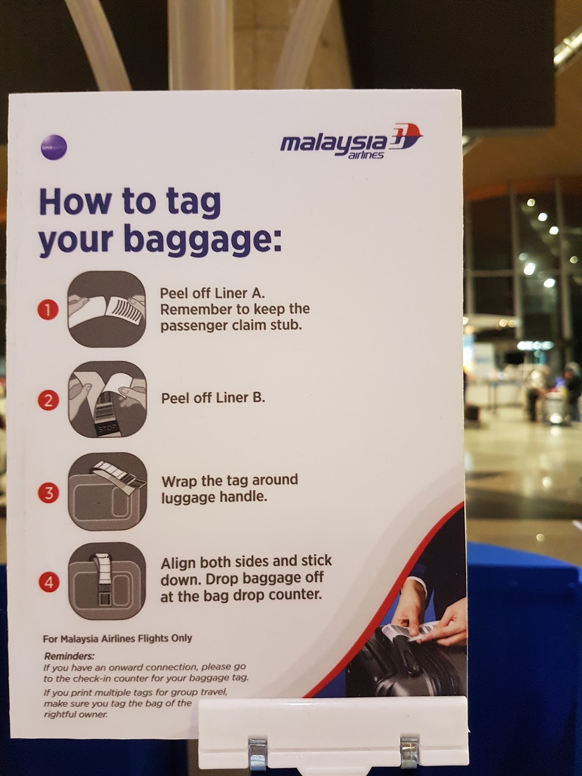 KL Holiday KLIA self check in and self print baggage tag kiosk