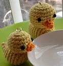 http://www.ravelry.com/patterns/library/crochet-duckie-duckie-charm-doll-toy