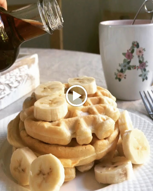 Canadian Birch sryup being poured on to a stack of mini waffles