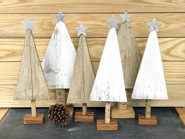 row of reclaimed plywood trees