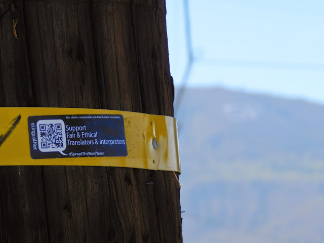 Fair and ethical translators and interpreters sticker tagging campaign for elingual.net and spreadthewordwear.com Santa Paula supports fair and ethical freelance translators, interpreters and language companies