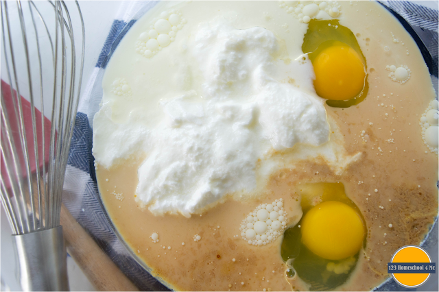 whisk together brown sugar, oat meal, flour, eggs, baking powder, yogurt, and vanilla extract