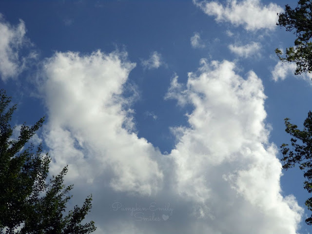 Clouds that look like two people or penguins dancing