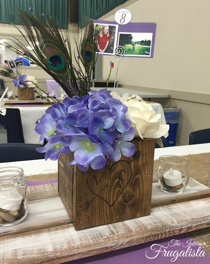 How to build rustic wooden table risers for wedding guest table centerpieces. A DIY budget wedding decor idea that is easy to make with fence boards.