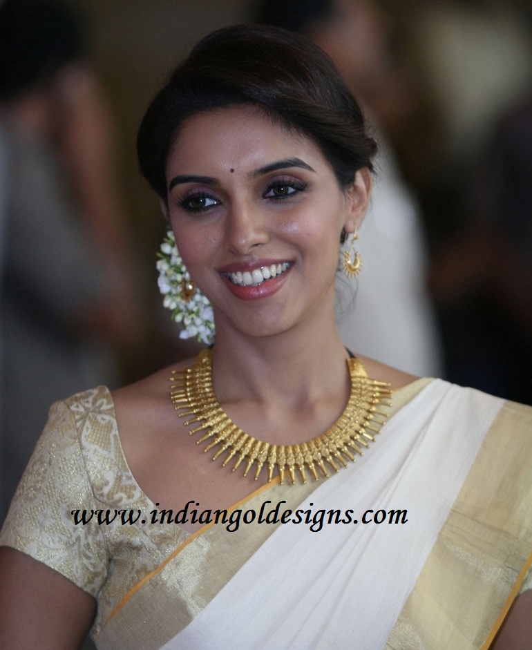 Gold and Diamond jewellery designs: asin in designer gold kerala ...