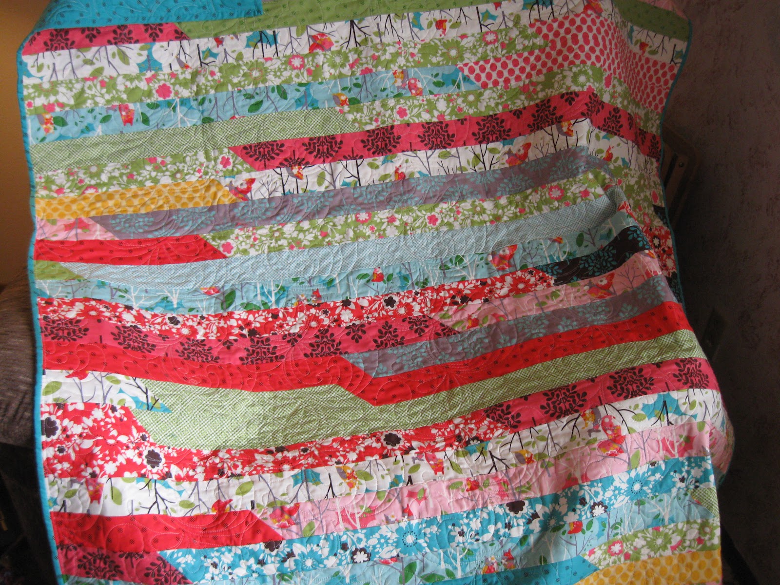 loves-to-quilt-jelly-roll-quilt