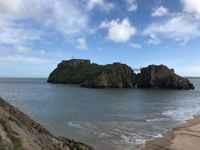 stunning photo of rock island in wales