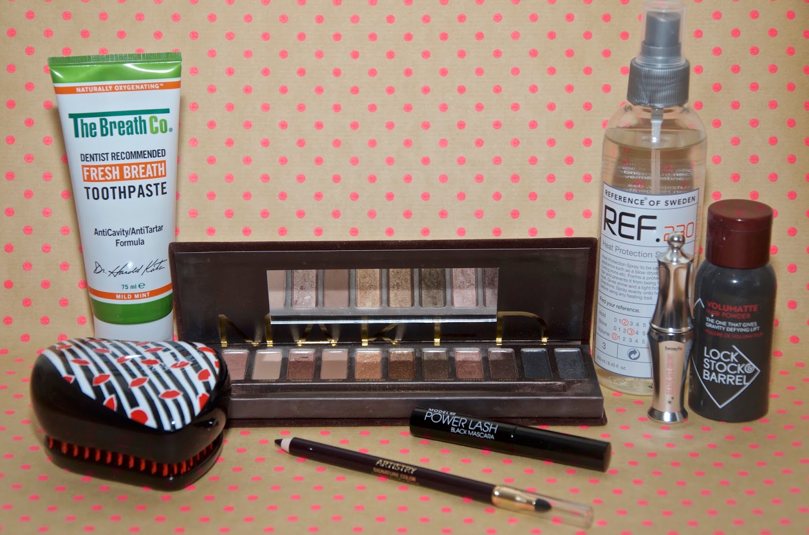Beauty products, toothpaste, tangle teazer, Urban Decay Naked Palette, Mascara, Haircare, eyeliner