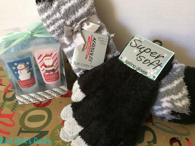 Make a Cozy Themed basket that has everything you need for a snowy day, curled up on the couch, including a cocoa-filled snowman!