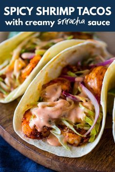 Spicy pan grilled shrimp tacos loaded with a zest honey cilantro lime slaw and topped with a creamy sriracha sauce. These tacos are spicy, sweet, zesty and bursting with flavor!