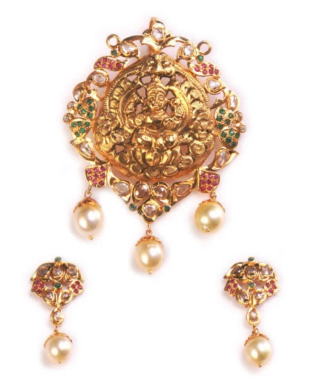 Gold and Diamond jewellery designs: Uncut Diamond lakshmi Pendant Sets ...