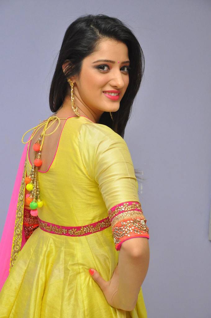 Telugu Cute Girl Richa Panai Photos In Yellow Dress At  Audio Launch
