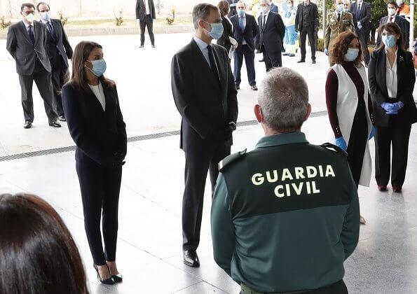 King Felipe and Queen Letizia of Spain visited the 112 Emergency Center in Madrid, Letizia wore Hugo Boss blouse