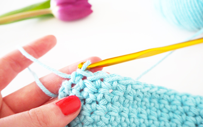 Turn your work and continue with three normal rows of double crochet.