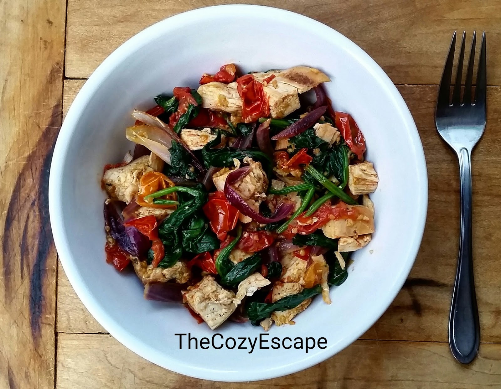 The Cozy Escape: Fast and Easy Leftover Grilled Chicken Breast with Spinach, Tomatoes, and Onions