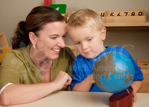 NAMC montessori absorbent mind ch 17 imagination. boy and teacher with globe