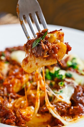 Gnocchi Poutine with Short Rib Ragu and Gremolatta with Stringy Melted Cheese