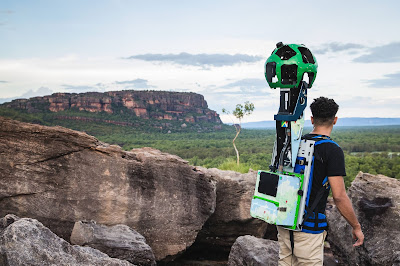 A photo of the Google Street View trekker backpack and man during the collect in Kakadu, with a beautiful view