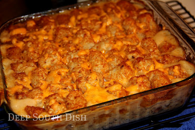 A well loved casserole of ground beef, and I like to also add smoked sausage, seasoned with sweet onion and bell pepper and a cream soup sauce and topped with crispy, crunchy tater tot potatoes and cheese.