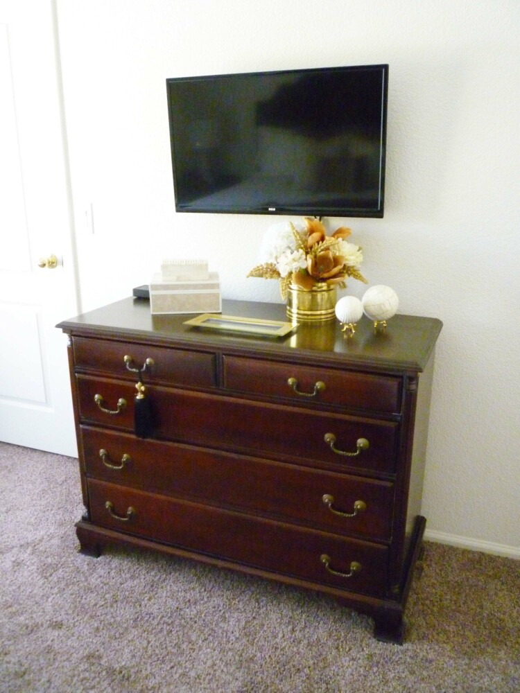 Tv on top of tall dresser deals