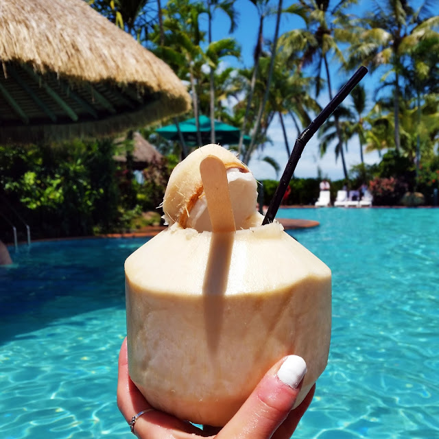 pina colada in coconut at pool pina colada in coconut at pool