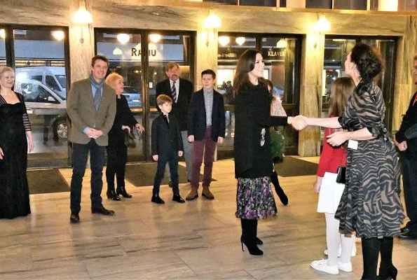 Princess Mary wore HEARTMADE Julie Fagerholt cape, Ralph Lauren white knit sweater, Prada boots and carried Bottega Veneta bag