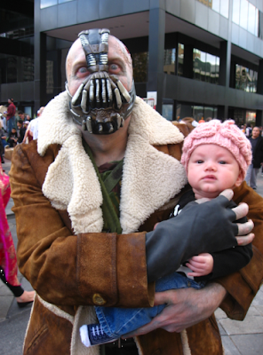 Zombie Bane from Batman and his baby brain snack