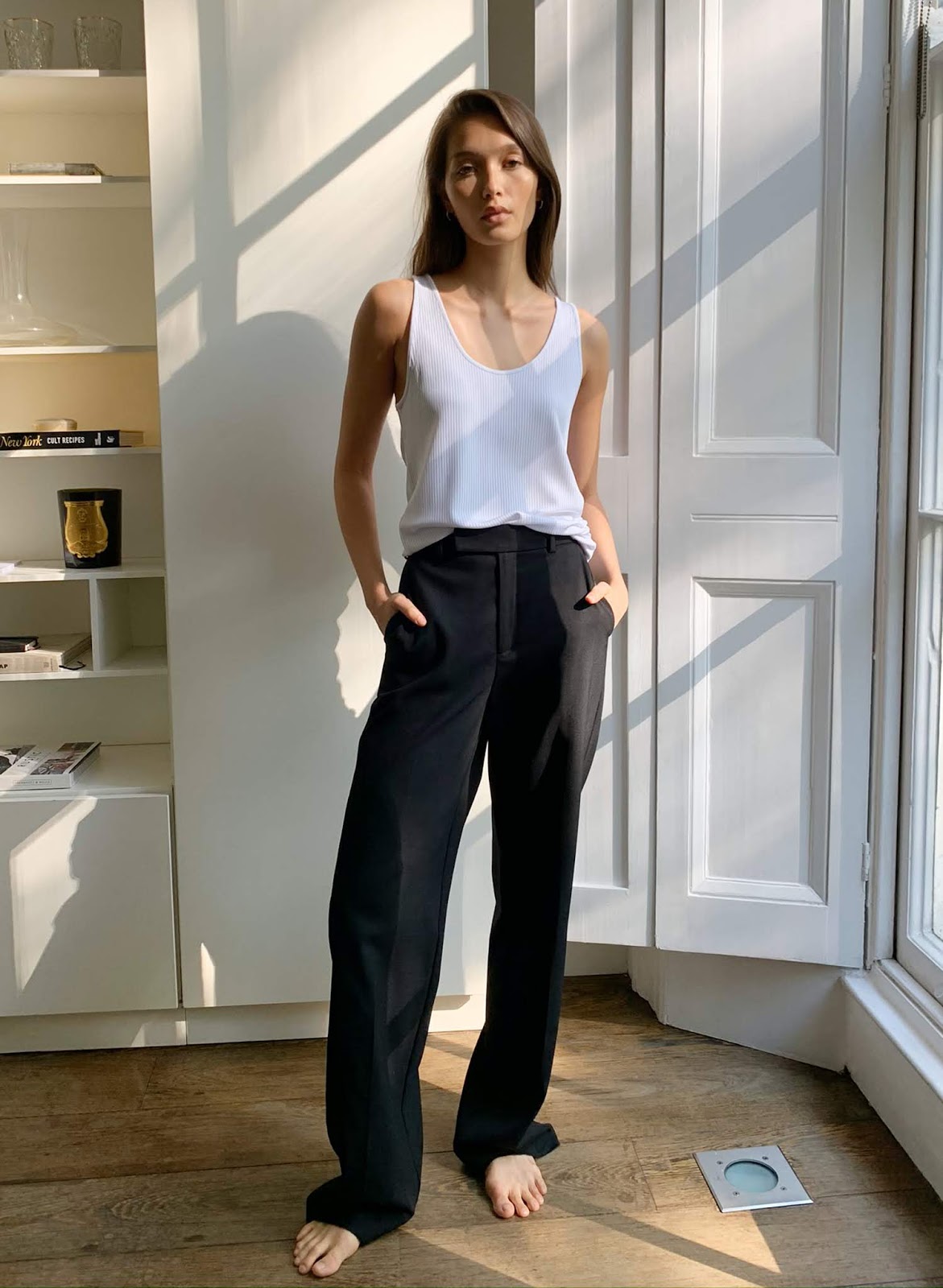 Easy and Stylish Work-From-Home Outfit Idea: White Ribbed Tank Top and Black Wide-Leg Pants