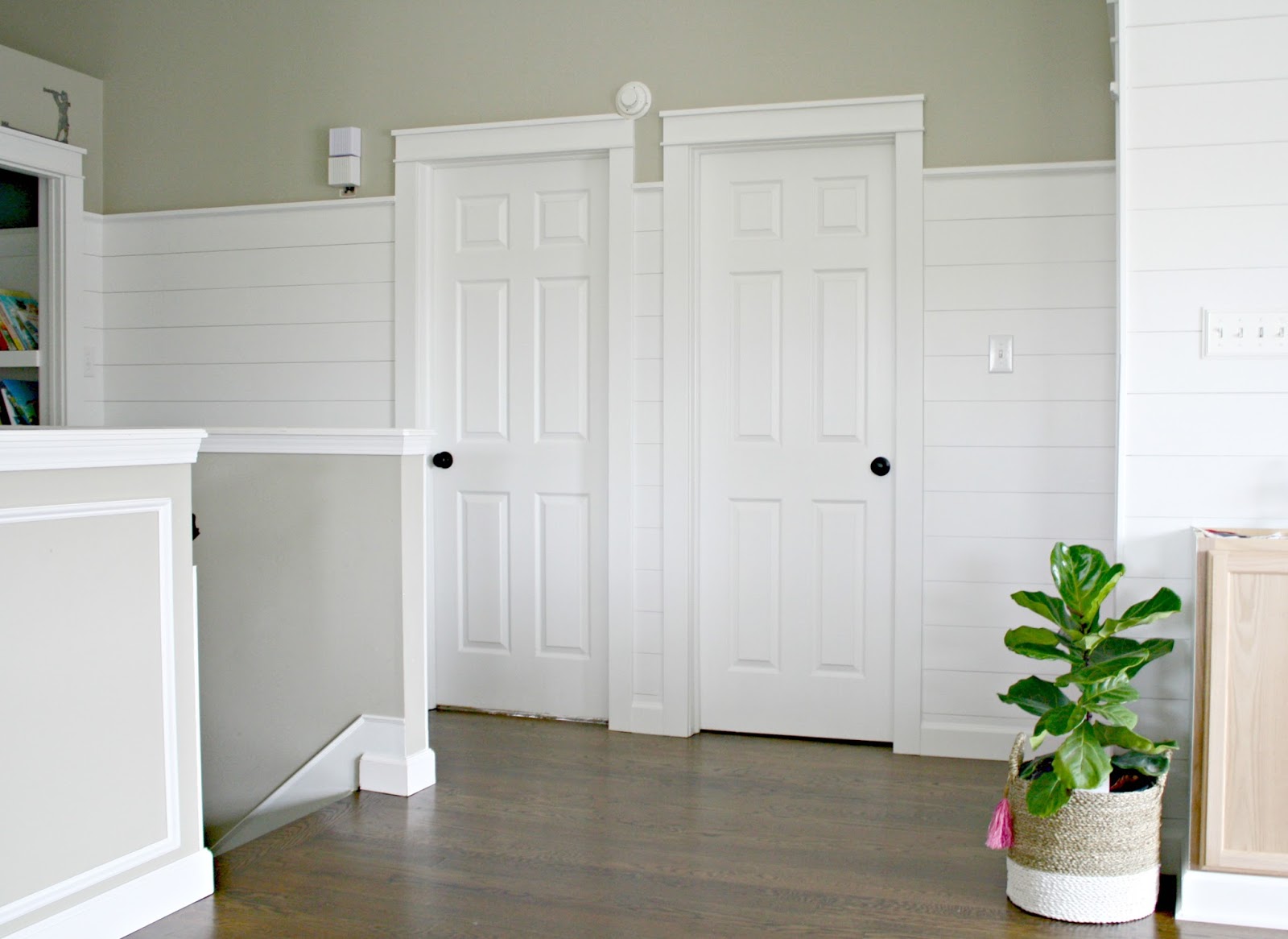 shiplap wall finished shiplap walls and farmhouse door trim in the loft shiplap wall finished shiplap walls and farmhouse door trim in the loft