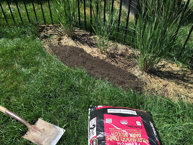 add top soil to mulch bed