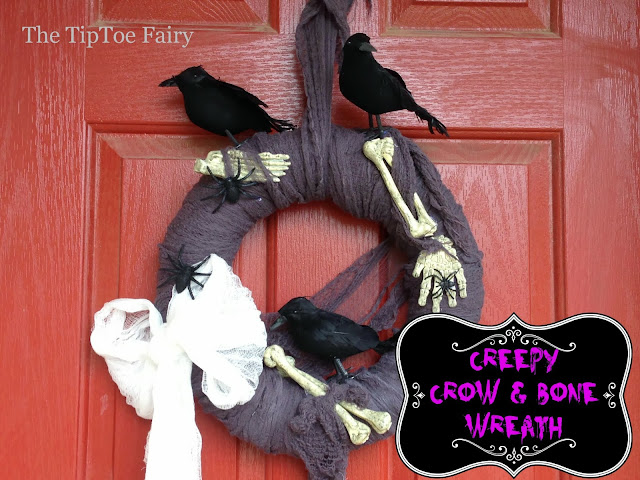 Creepy Crows and Bones Halloween Wreath | The TipToe Fairy #halloweendecorations #halloween #wreathtutorial #halloweentutorial