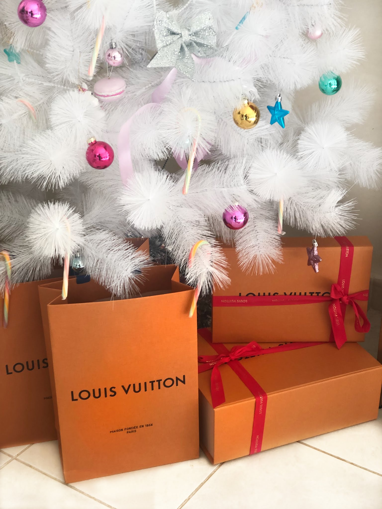 White pretty Christmas Tree with LV shopping bags