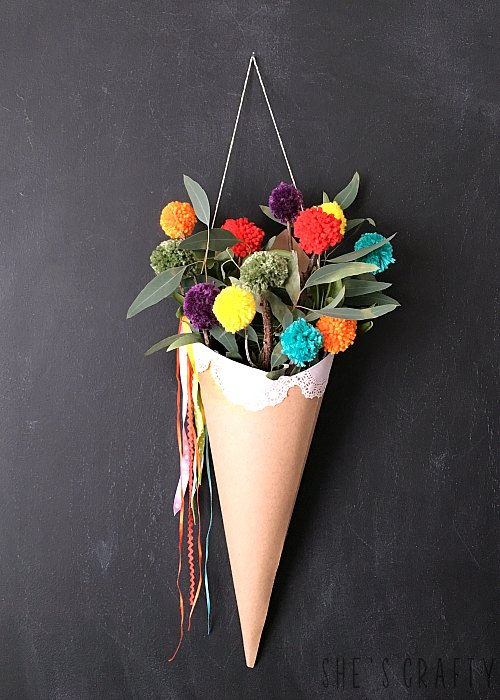 Freshen up your space for Spring with a colorful wall hanging - how to hang a paper cone