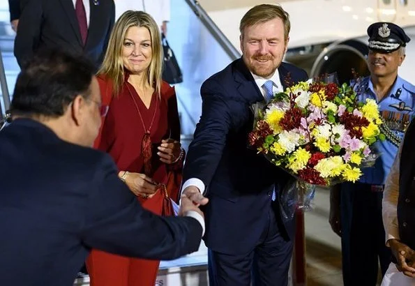 Dutch Queen Maxima wore Claes Iversen red Laperm classic blazer and red Lykoi trousers and red Korat silk blouse