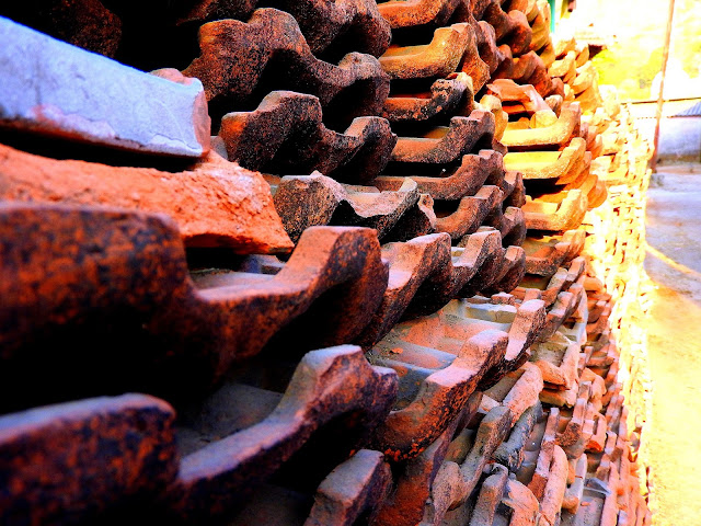 Pile of house roof tiles on the village walk | Adgaon, Maharashtra - India Pile of house roof tiles on the village walk | Adgaon, Maharashtra - India