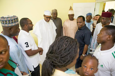 Photos: Pres. Buhari visits Abuja bomb blast victims, pays bill of girl shot by armed robbers