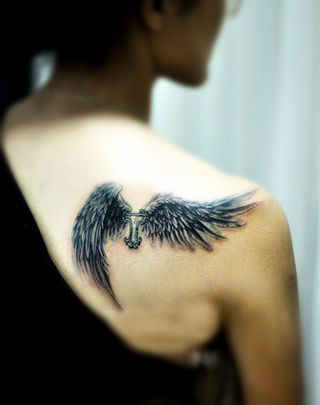 Angel wing tattoo for girls on 2014 | New Tattoos