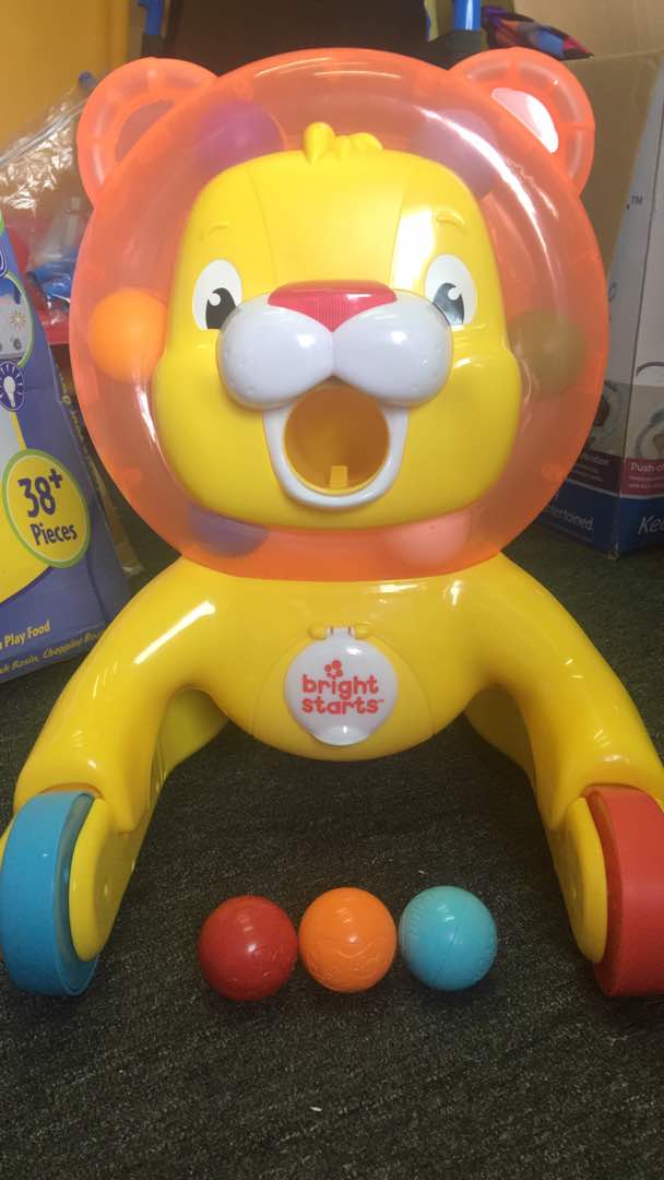 bright starts step n ride lion