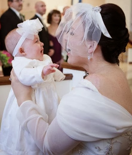 beautiful bride with baby