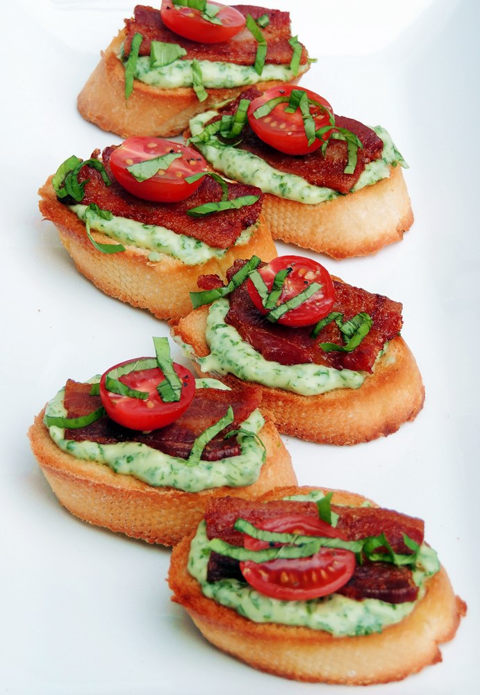 BLT Crostini with Basil Mayonnaise are the perfect bite for your next party from www.bobbiskozykitchen.com