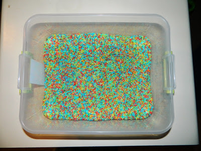 Multi-colored rice in a "sensory bin"