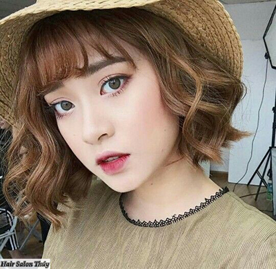 Tóc ngắn uốn xoăn kieu toc ca tinh cho mua thu