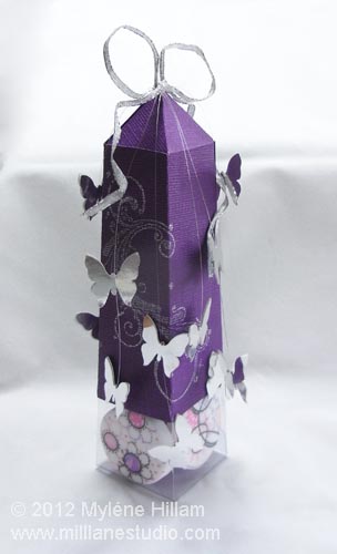Handmade purple obelisk box filled with zendoodled mint patties.