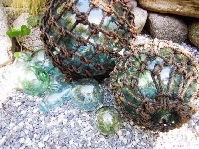 vintage glass fishing net floats, hand blown glass balls, blue green amber  amethyst colored glass