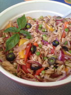 Easy Orzo Salad served family style in a large, deep bowl.